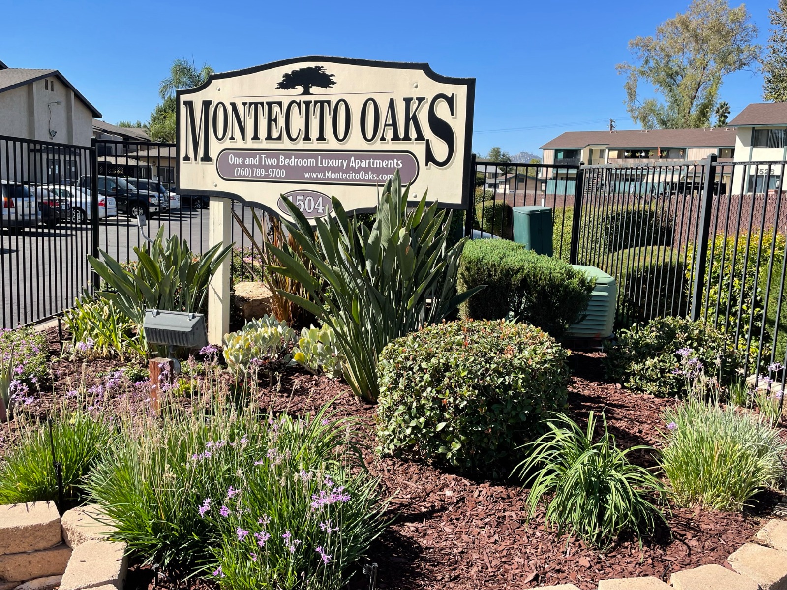 Property entrance with clean, water-wise plant beds
